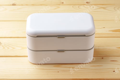 Preview: New empty plastic lunch box on a wooden background