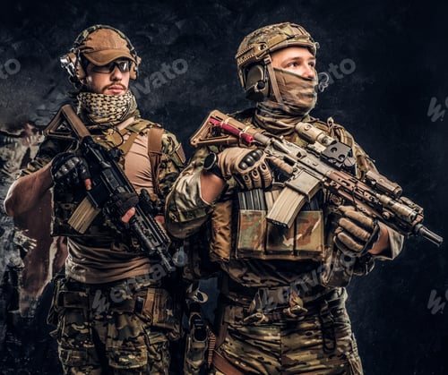 Preview: Two special forces soldiers in full protective equipment with assault rifles