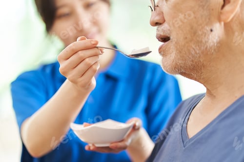 Preview: A caregiver who assists the elderly with meals