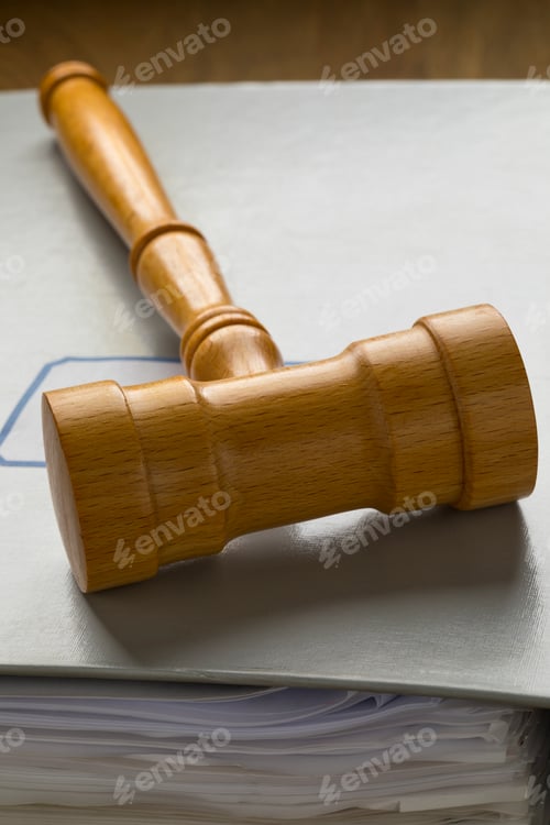 Preview: Gavel on a map with papers