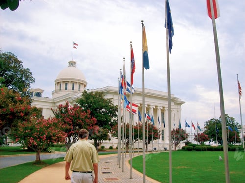 Preview: The Alabama State Capitol in Montgomery AL & man walking on premises while traveling USA’s 50 States