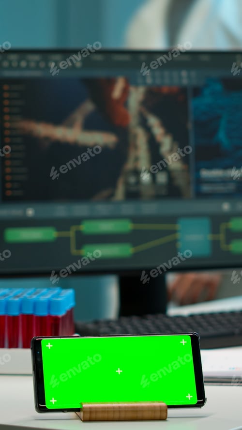 Preview: Microbiologist putting blood sample near green screen phone