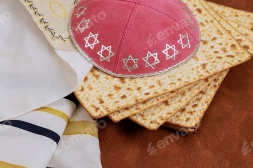 Preview: Traditionally, Jews celebrate Passover by eating unleavened matzah bread a wearing kippahs a tallits