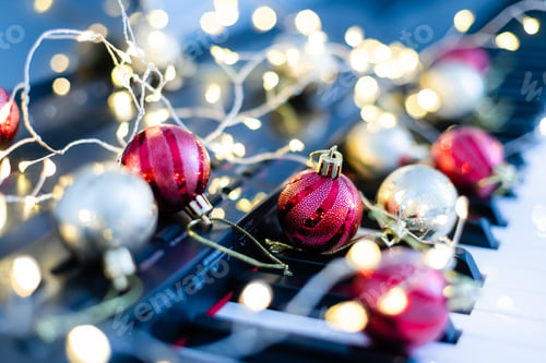 Preview: New Year's composition on a musical synthesizer. lights of a garland. Merry Christmas greeting card