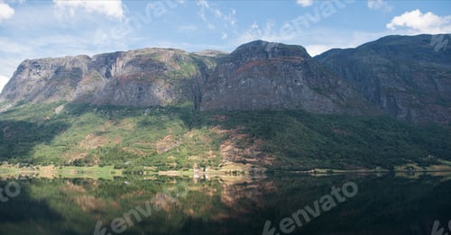 Preview: scenic view of mountain reflecting in lake water, Hallingskarvet National park, Norway