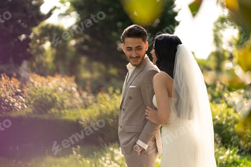 Preview: Bride and groom chatting and laughing