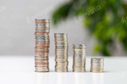 Preview: Coins stack in different heights showing currency value change in economy