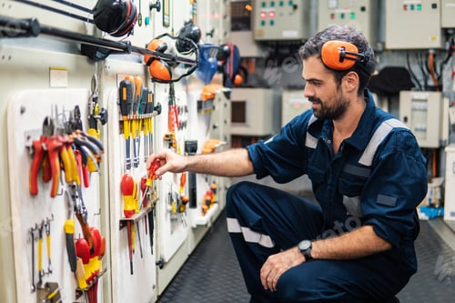 Preview: Marine engineer officer working in engine room