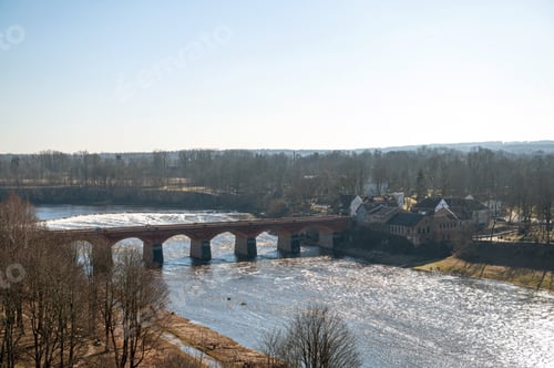 Preview: Old red brick bridge over Venta river in Kuldiga - UNESCO World Heritage site, Latvia