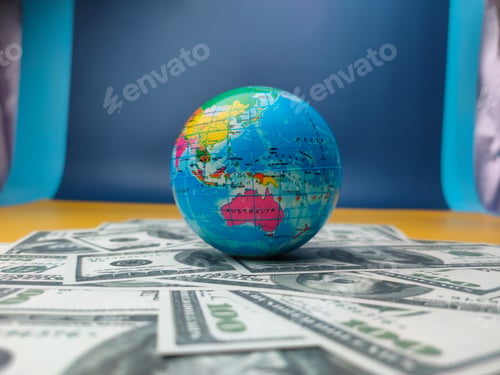 Preview: Behide the scene earth globe and banknotes shooting. Business concept.
