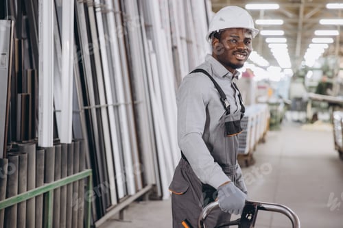 Preview: Factory worker transporting aluminum and pvc windows and doors profiles