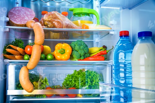 Preview: Open refrigerator filled with food