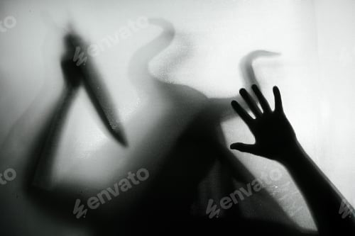 Preview: Horror, halloween background - Shadowy figure with horns behind the glass