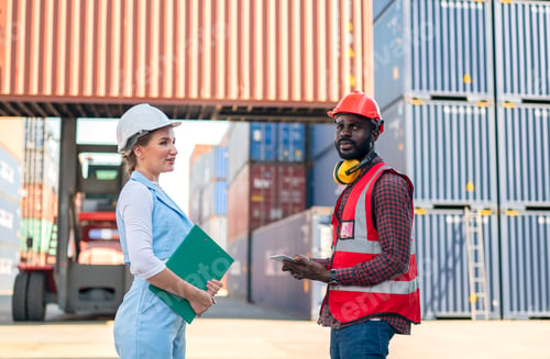 Preview: foreman checking containers in the terminal, at import and export business logistic company.