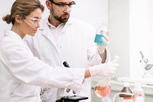 Preview: Two students are working in laboratory during science research work.