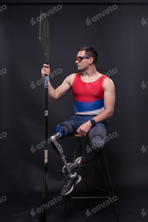 Preview: One Young Adult Man Only, Sitting In Bar Stool, Athlete Sportsman Canoe Kayak Paddle, Prosthetic