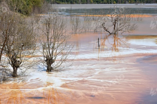 Preview: Surreal natural patterns. Residual gold mining leach waters polluting the environment
