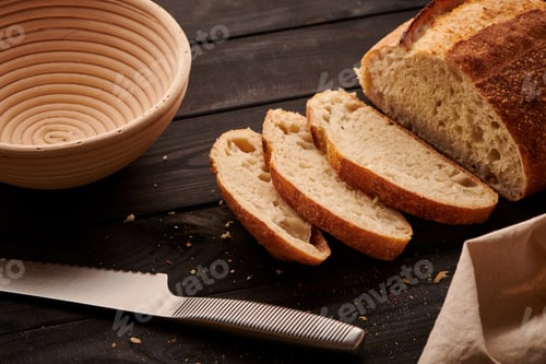 Preview: Homemade tartine bread on dark wooden table