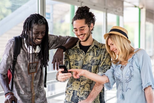 Preview: Happy group of friends traveling and walking in airport or station