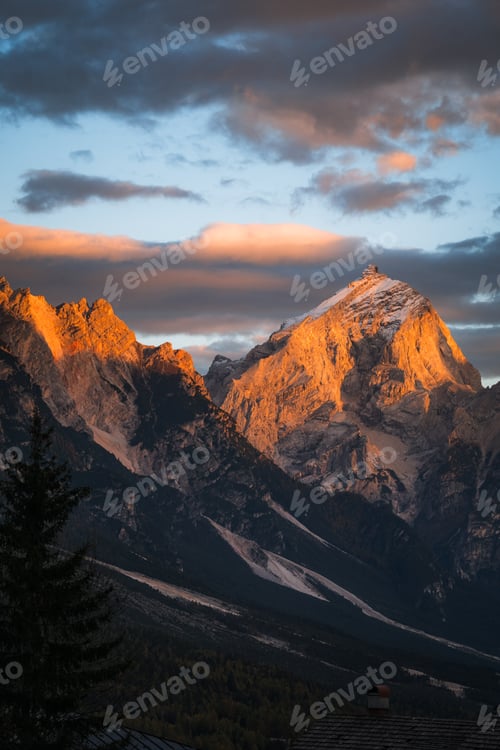 Preview: High angle of orange mountain peak at sunset in The Dolomites South Tyrol Italy