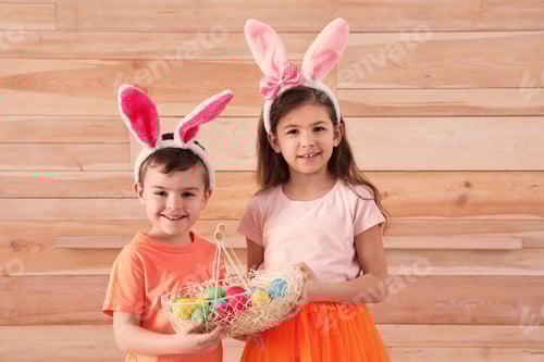 Preview: Young Children Celebrating Easter with Painted Eggs