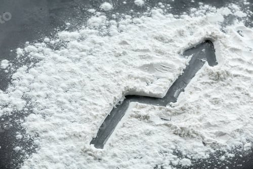 Preview: ascending arrow drawn on a sprinkled flour powder.