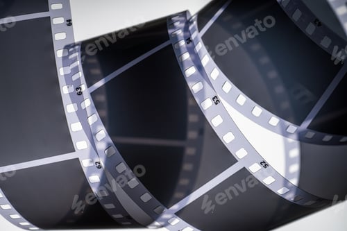 Preview: Film strip unrolling, representing cinema and vintage photography.
