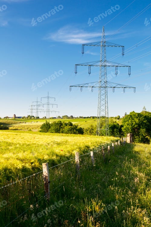 Preview: Electricity Pylons In Green Landscape