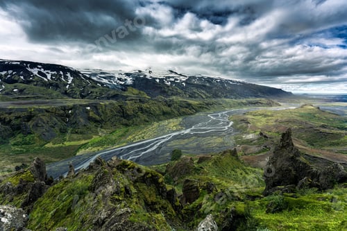 Preview: Volcanic landscape of Valahnukur trail in Thorsmork valley and moody sky in summer at Iceland