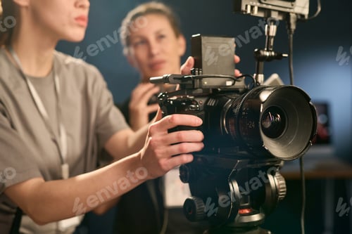 Preview: Close Up of Woman Operating Digital Camera