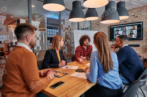 Preview: In the vibrant ambiance of a modern startup office, a diverse team of business professionals engage