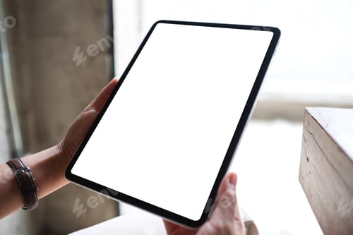 Preview: Mockup image of a woman holding digital tablet with blank white desktop screen