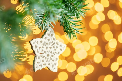 Preview: Christmas tree background and Christmas decoration with snowflake on golden bokeh background