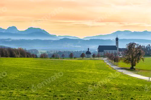 Preview: Green meadow, road, chapel, church and mountains. Alpine landscape, Germany