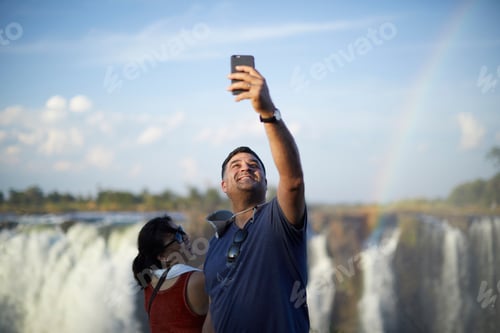 Preview: Tourists taking selfie, Victoria Falls, Zimbabwe