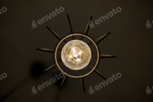 Preview: Dramatic Close-Up of an Illuminated Lightbulb Fixture