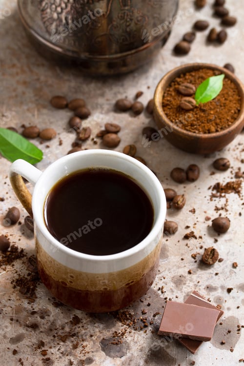 Preview: Morning coffee concept. Cup of coffee latte and coffee beans.