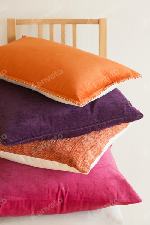 Preview: colorful cushions on chair cozy home mood