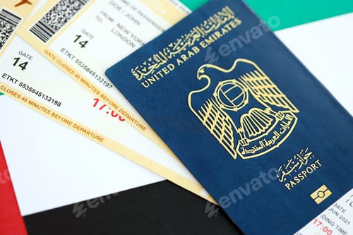 Preview: United Arab Emirates passport and boarding pass tickets on flag. The concept of travel and vacation