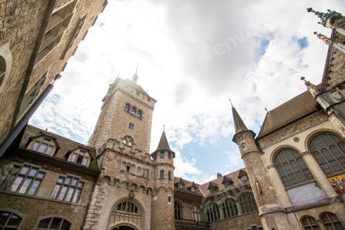 Preview: Medieval castle reaching into a cloudy sky