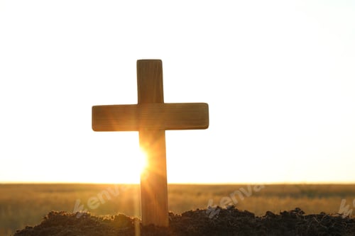 Preview: Wooden Christian cross outdoors at sunrise, space for text. Religion concept