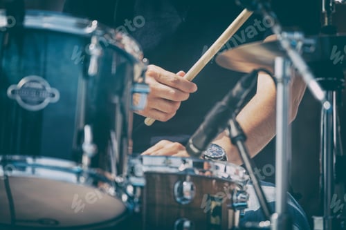 Preview: Man drumming, closeup shot of hands
