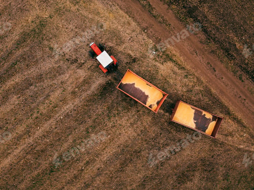 Preview: Aerial view of agricultural tractor in the field