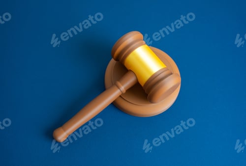 Preview: Judge's gavel on a blue background. Courts and democratic institutions. Justice and legislation.