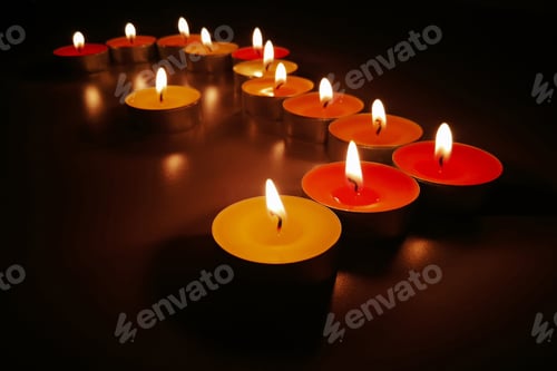 Preview: Tealight candles in the dark. Concept of meditation and peaceful life.