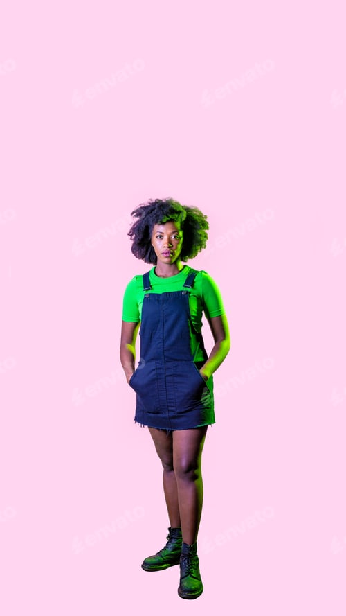 Preview: Confident black hair young woman posing isolated background looking camera serious