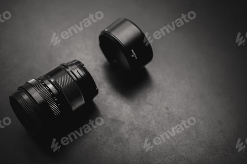 Preview: Gray scale high angle shot of a camera lens