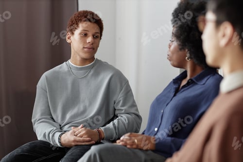 Preview: Teen Boy Listening to Therapist in Support Group Meeting