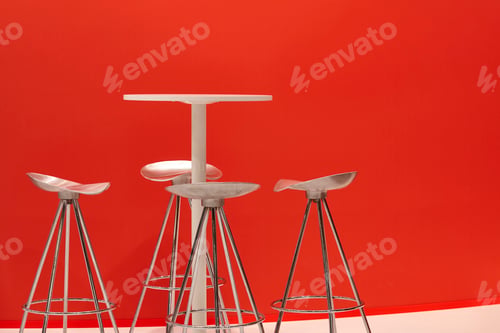 Preview: Bar interior with stools and table. Red wall. Stylish interior