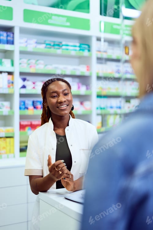 Preview: Friendly Pharmacist Assisting Customer in Modern Pharmacy Environment